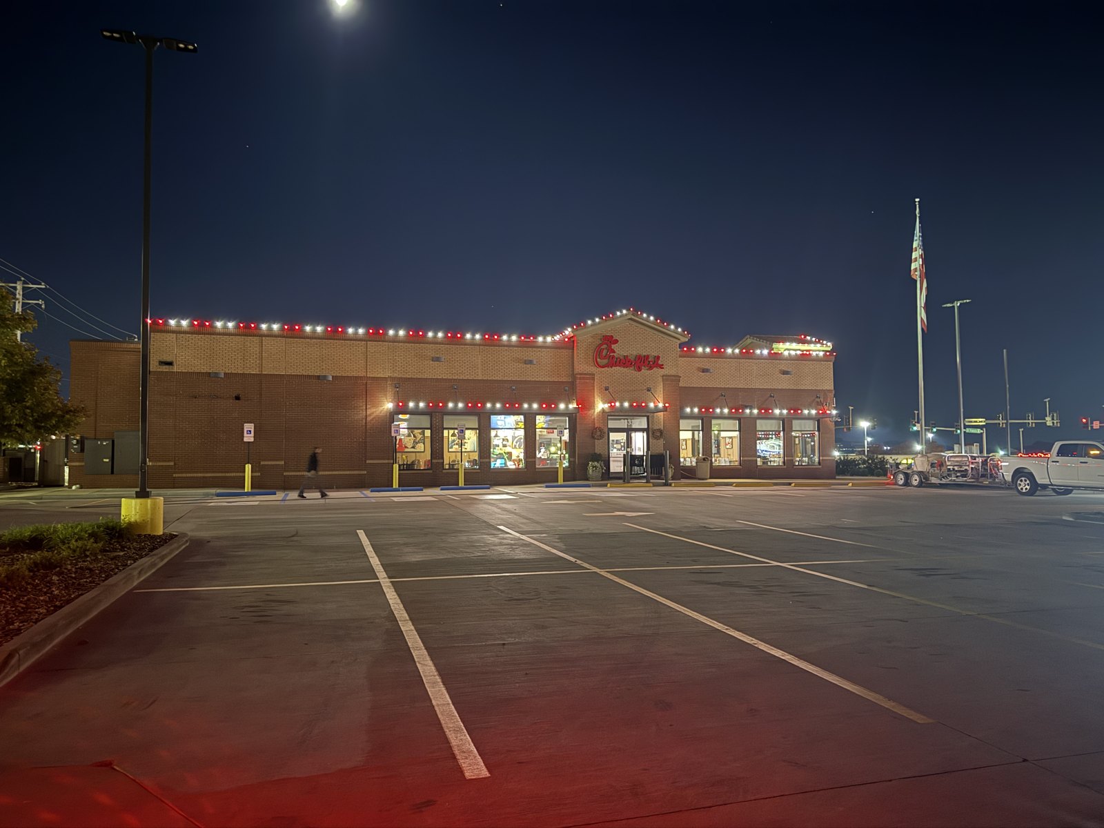 Holiday roofline lighting at a commercial property